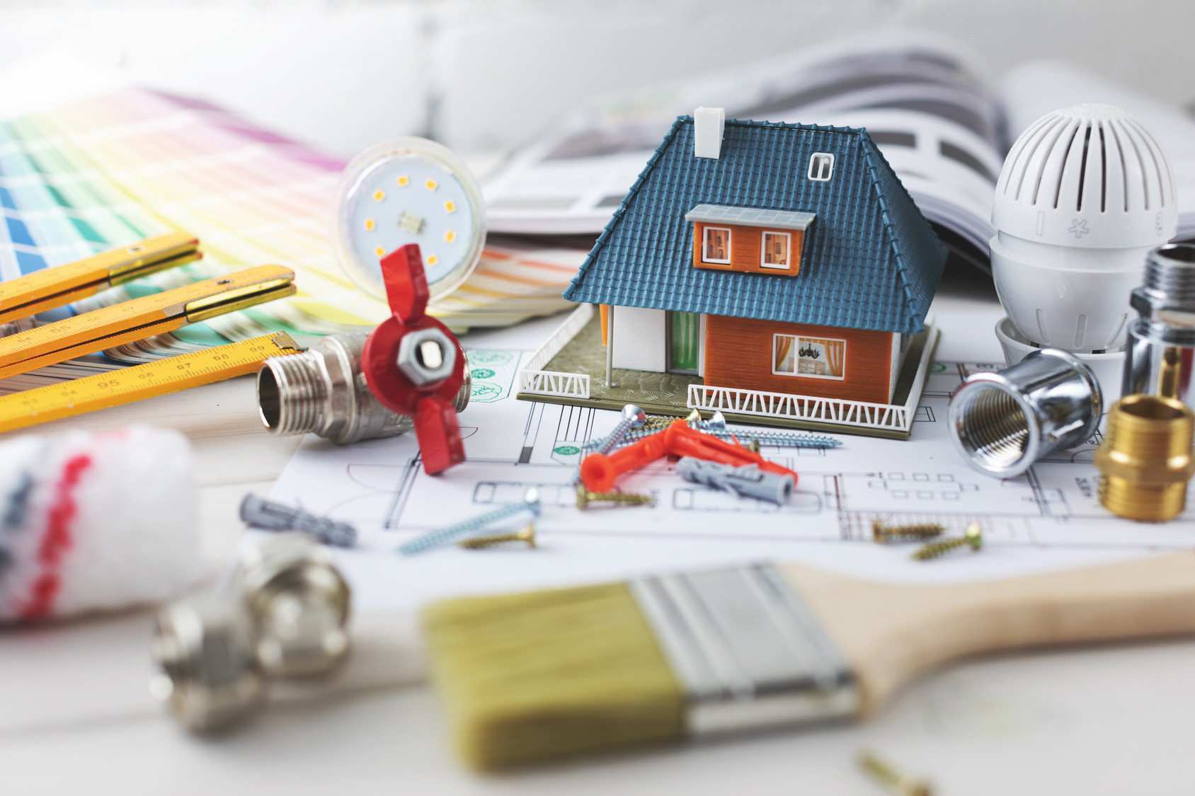 house building and repair concept - construction and design items on housing plan